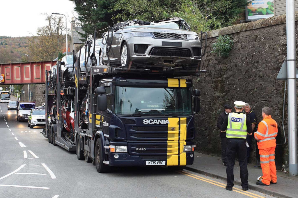 Range Rovers destroyed truck hits bridge