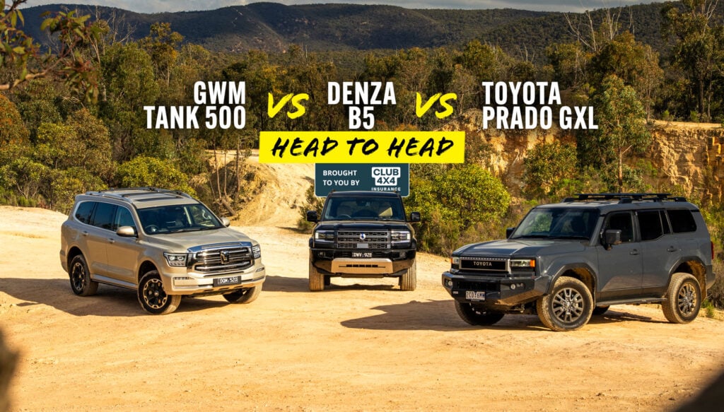 Three off-road SUVs parked in a dusty lot with a rocky hillside; bold banner reads Head to Head between the vehicles (GWM Tank 500, Denza B5, Toyota Prado GXL).