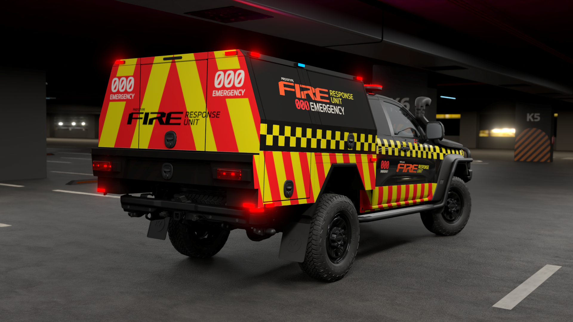 Three-quarter rear view of a fire-responder pickup with red-and-yellow chevron livery, flashing red lights, and bold 'FIRE' lettering in a dim parking garage.