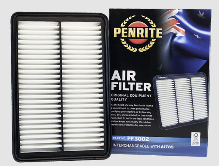 Penrite air filter beside its packaging, showing a pleated white filter in a black frame.