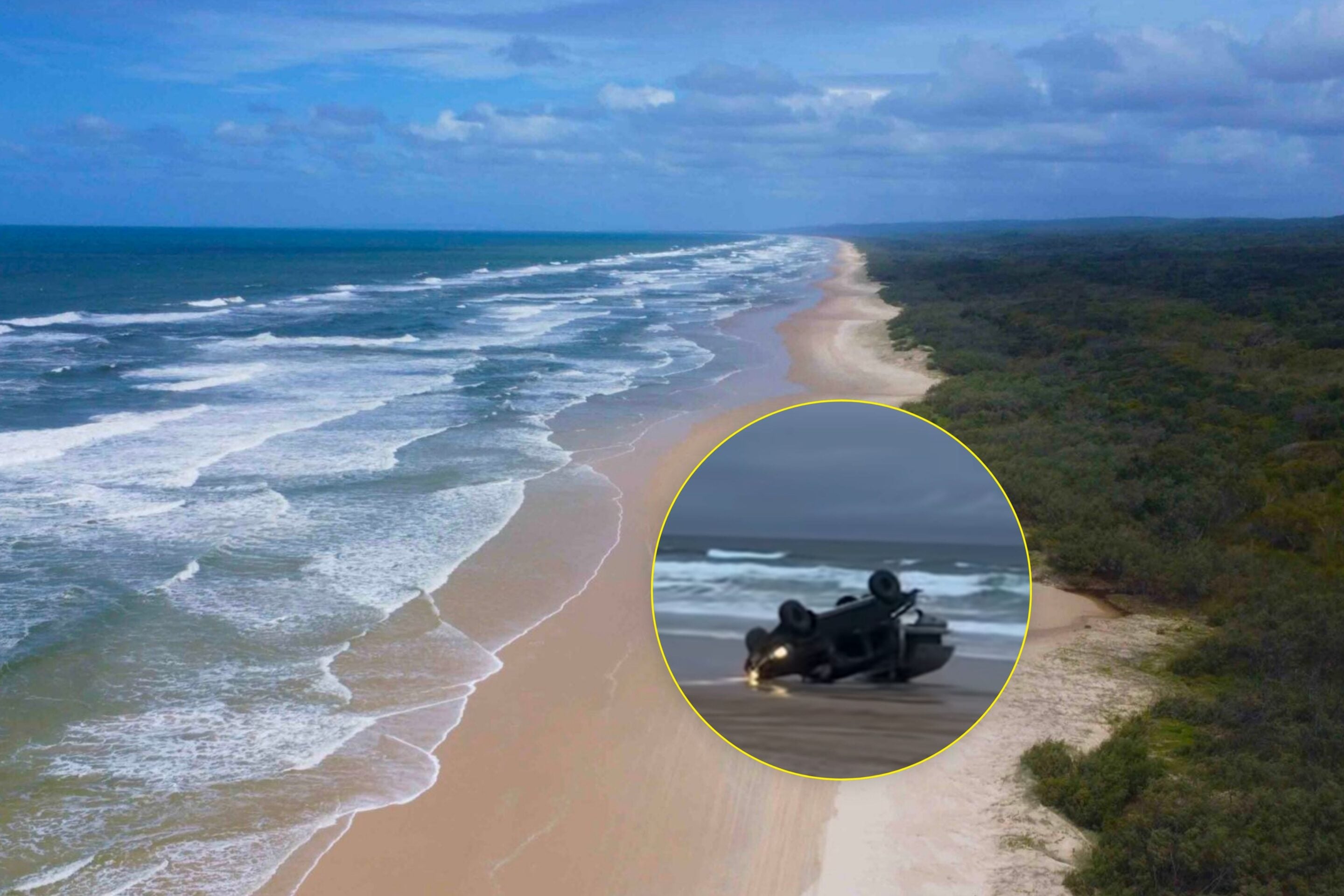 Aerial view of a long sandy beach with blue ocean and a forested coastline; an inset circle shows an overturned vehicle on a wet road.